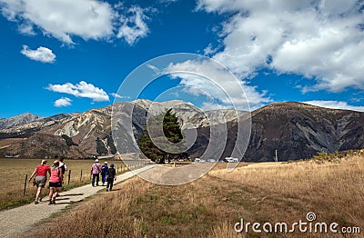 Tourists visiting Castle Hill in Southern Alps, Arthur's Pass, South Island of New Zealand Editorial Stock Photo